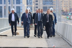 Начали асфальтировать первую часть нового моста через Мухавец на бульваре Шевченко